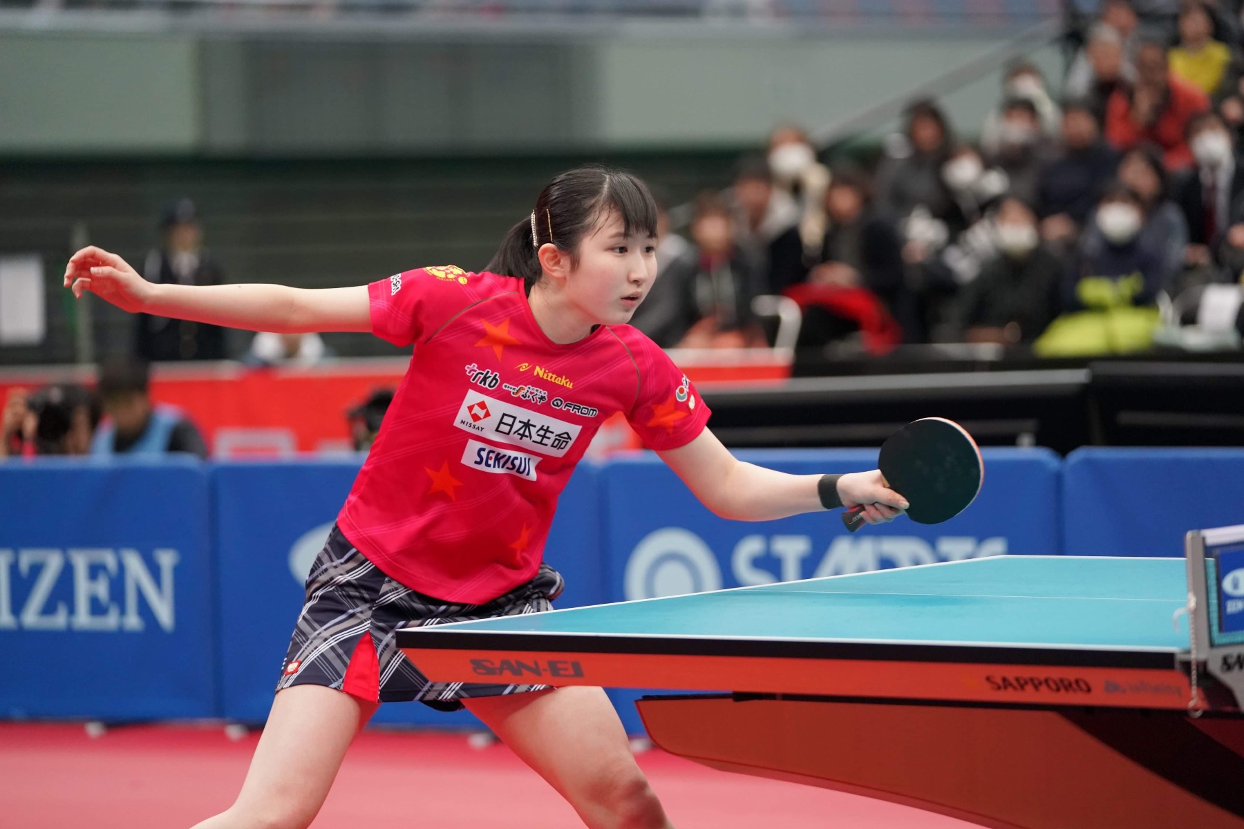 試合をする早田選手